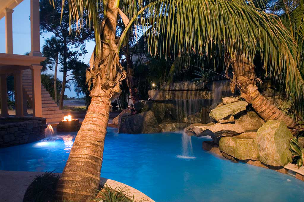 Lagoon pool with Tennessee Field stone grotto, spa and fire feature on Siesta Key, Florida