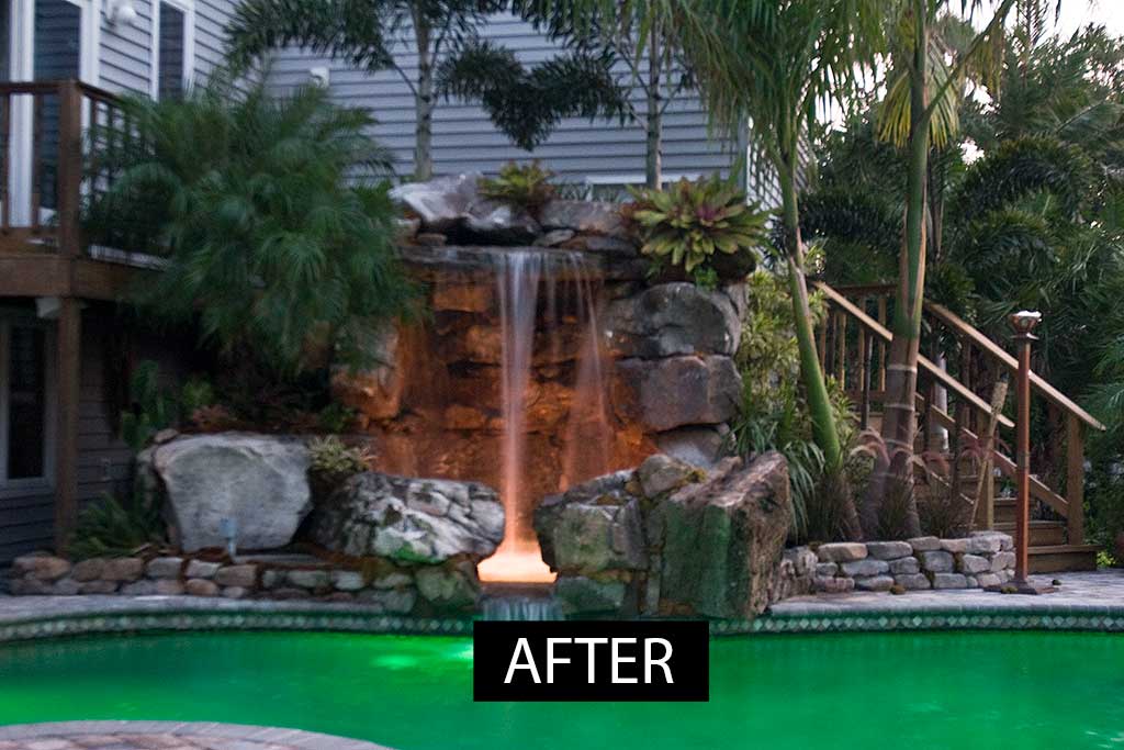 Lagoon pool remodel with large Tennessee field stone grotto by Lucas Lagoons Inc.